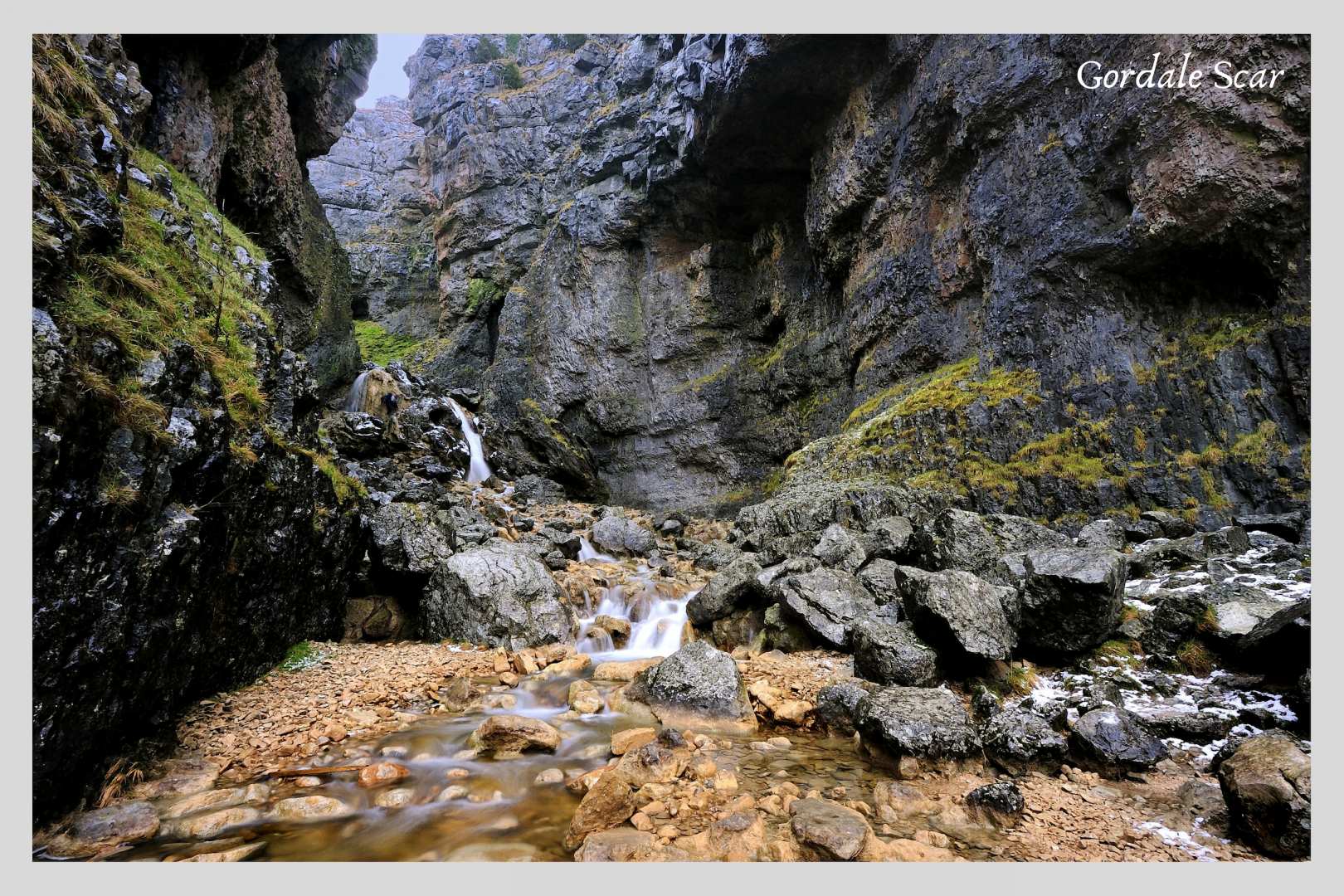 Circular Walking Trails: the high stone walls of Gordale Scar on the Three Dales Way walk